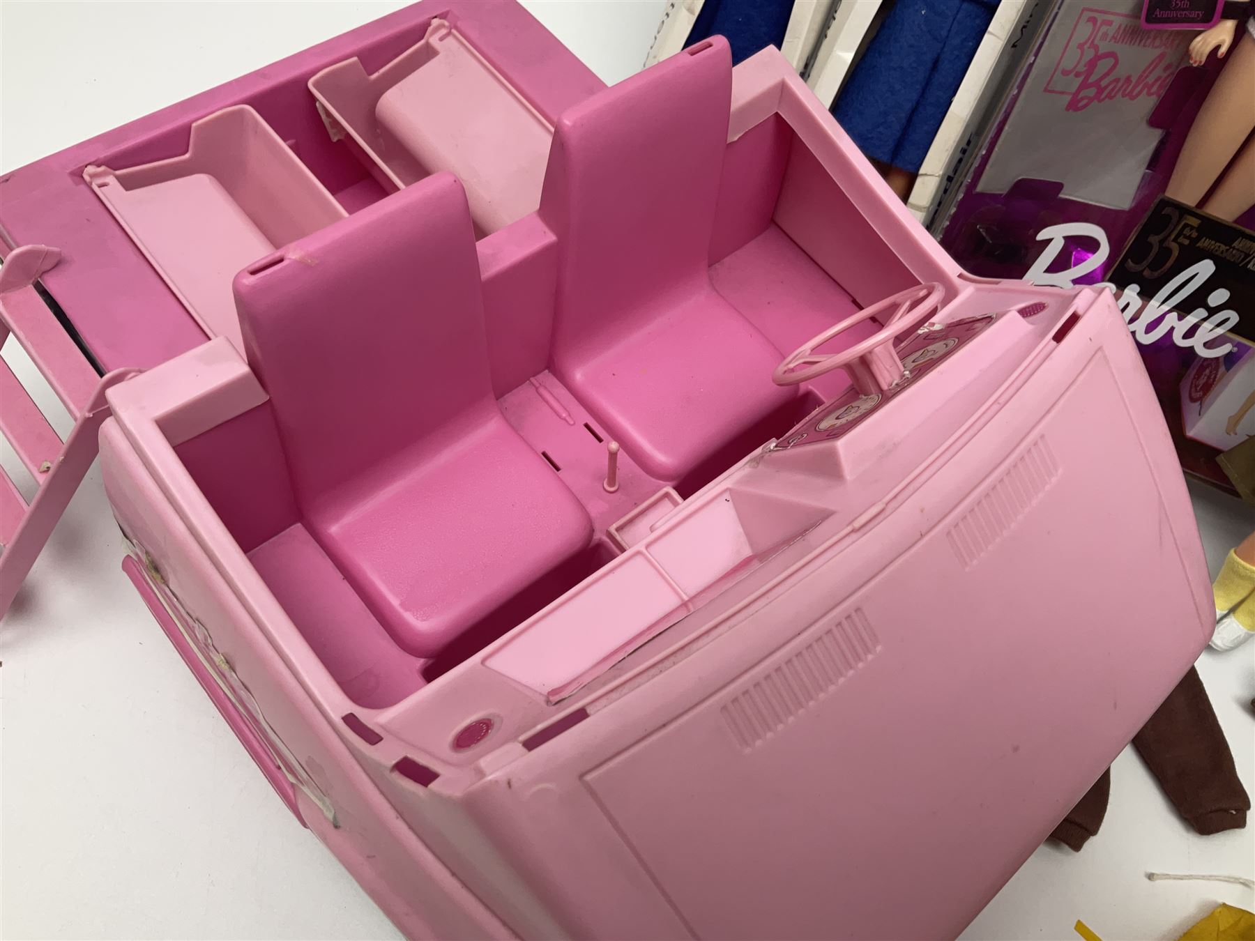 Barbie - 35th Anniversary fashion doll in factory sealed box; incomplete Magical Motorhome; three fashion doll horses; two Wardair flight attendant dolls; and Girl Guide doll with clothing and tent