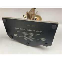 Beswick matte Hereford Bull, with stamped mark beneath, on wooden plinth, together with a limited edition Bradford Exchange John Wayne model, tallest H36cm