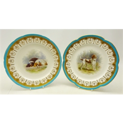  Matched pair of late Victorian Minton shaped dessert plates hand painted with a Brittany Spaniel and two King Charles Spaniels after Landseer, by Henry Mitchell within a border of gilt beaded swags, floral roundels and crosshatched panels with turquoise rim, the Spaniel initialled 'HyM', D24cm & D23.5cm, c1870 pattern no. G154 (2) Provenance Property of Bob Heath, Brandesburton Formerly of Ravenfield Hall Farm near Rotherham  