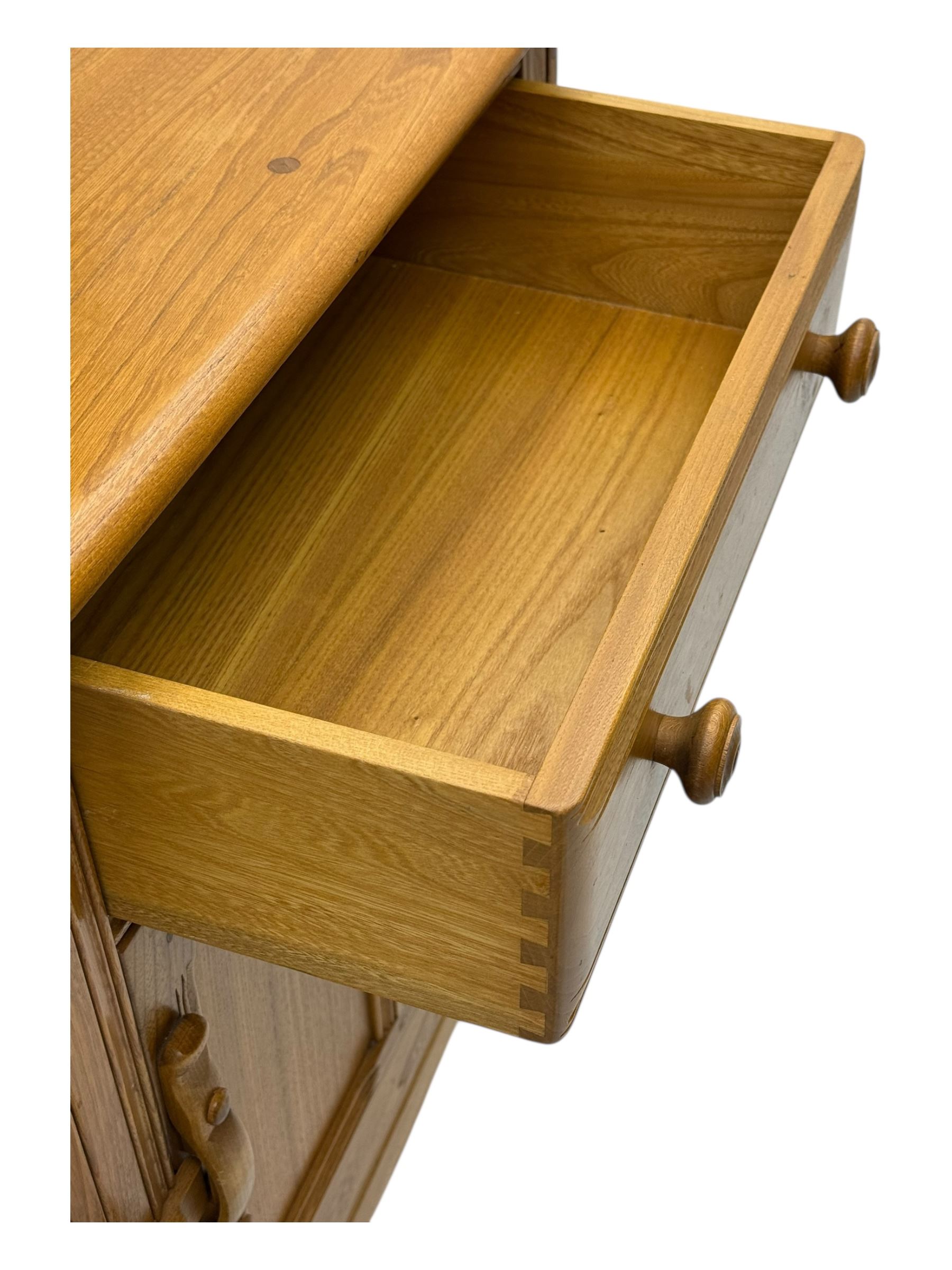 Ercol - golden dawn light elm dresser, plate rack above two drawers and two cupboard doors with sliding wooden lock mechanism 