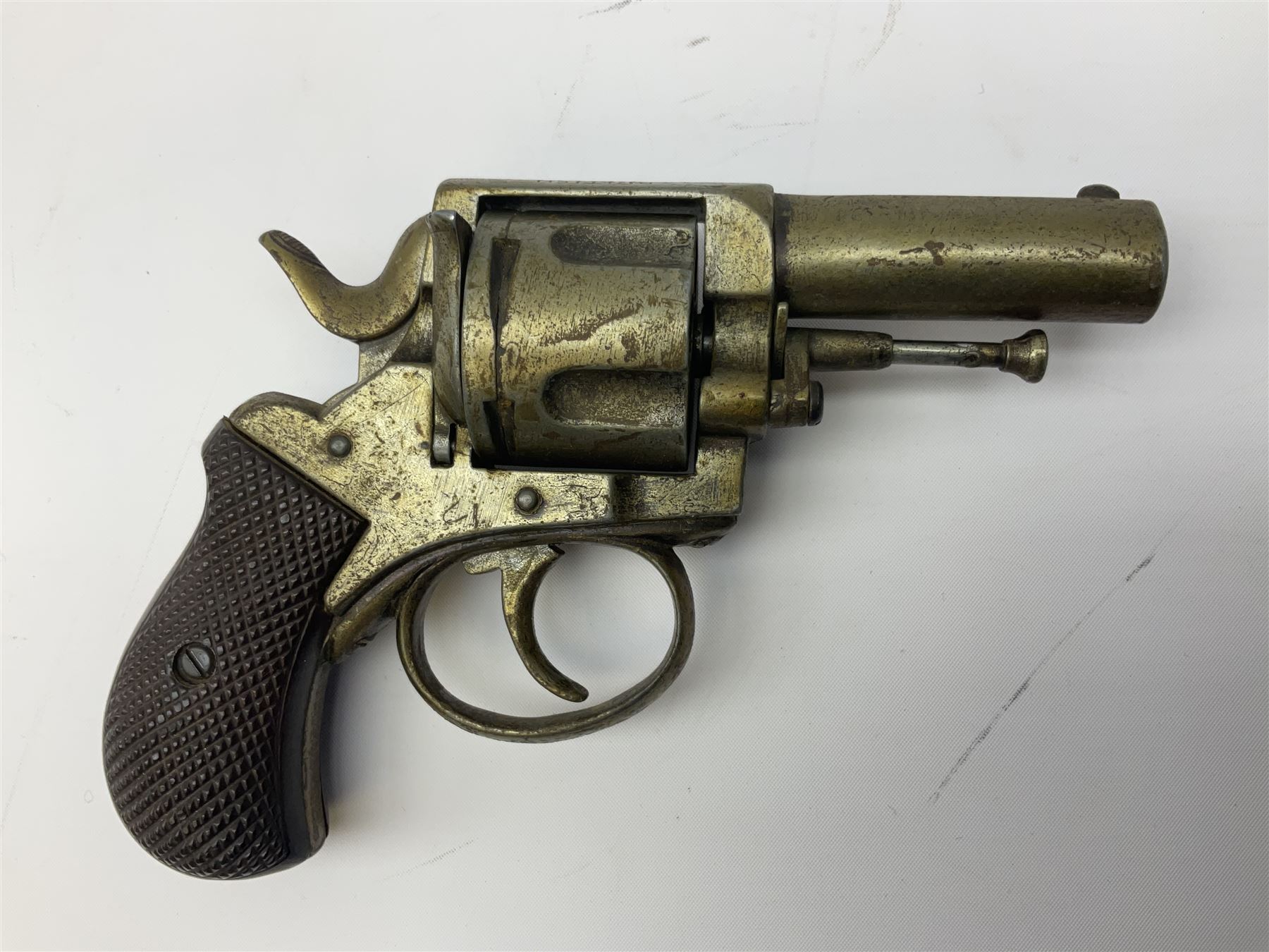 Early 20th century Flobert 5mm blank firing revolver with six-shot chamber, top venting, nickel plated with folding trigger No.118 L12.5cm overall; replica non-firing 'British Bulldog' revolver; and Windproof gas lighter inscribed 'Revolver-99 Spring and Autumn' in holster marked 'Star-Line'
