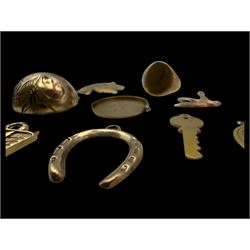 9ct gold charms, including crossed swords, signet ring, horseshoe and leaf, and a 14ct gold fireplace charm