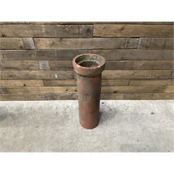 3 cauldron set pots with 2 terracotta chimney pots, 1 terracotta crock, metal bucket and small cast iron shelf 