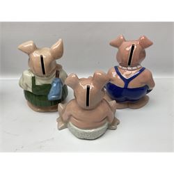 Set of five Wade NatWest money boxes, comprising father, mother, boy, girl and baby