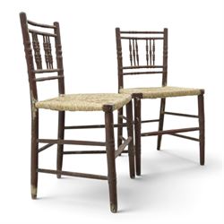 Pair of 19th century lacquered faux bamboo rush seated side chairs chairs, original blue paint under later ox-blood lacquer finish