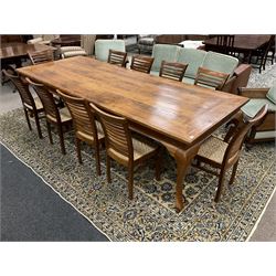 Large teak dining table, moulded rectangular top, on cabriole supports, together with a set of ten ladder back dining chairs with cane work seats