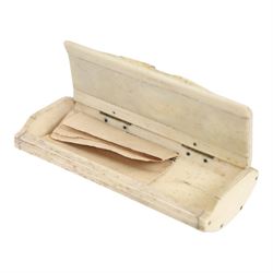 French Napoleonic Wars prisoner of war bone snuff box 1805-20, with coloured insets in the hinged lid depicting a man and woman facing each other with a central image of two hearts pierced with an arrow, H2cm, L9cm 