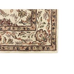 Gooch Carpets - Persian design ivory ground rug, trailing and interlacing design decorated with stylised plant motifs, within floral border and guard stripe 