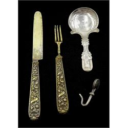 George IV silver caddy spoon, with bright cut decoration by John Bettridge, Birmingham 1820, pair of Georgian silver-gilt  fruit eaters, makers mark IT and a silver napkin holder hallmarked