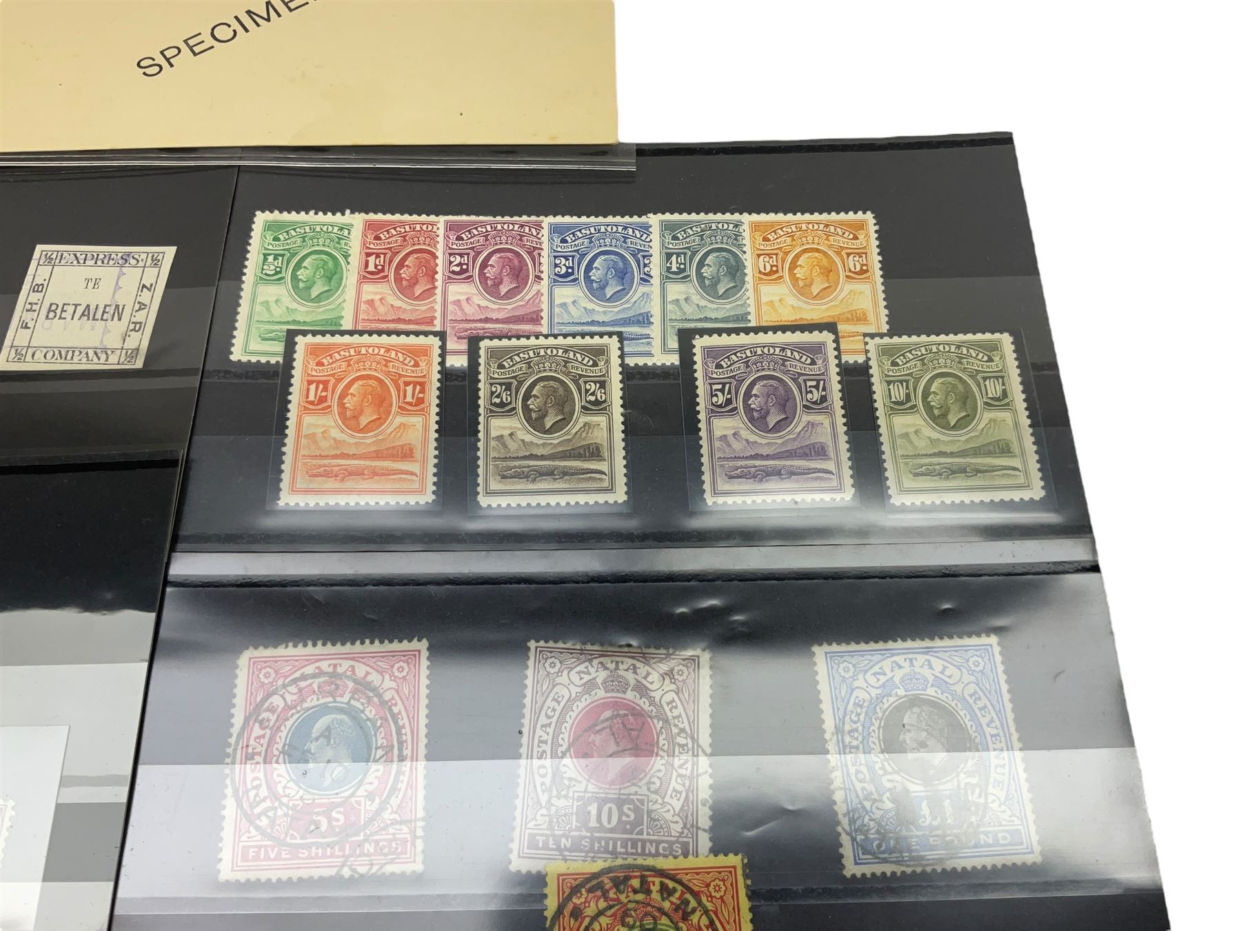 Transvaal King Edward VII 1903 five pounds with 'registered' cancel, Natal King Edward VII 1908/9 one pound, Basutoland King George V 1933 set of ten to ten shillings and other stamps with specimen overprints etc