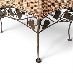 Basket work coffee table featuring scrolling leaf edging on tapered lags