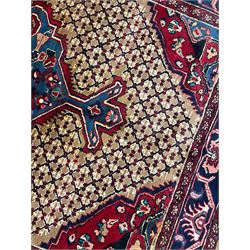 North West Persian Bidjar rug, large floral design shaped pole medallion on a brown field decorated with lattice pattern, the border decorated with trailing branch and stylised plant motifs