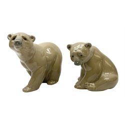 Two Lladro figures of bears, brown bear standing, no 1204, and brown bear seated, tallest example H10cm