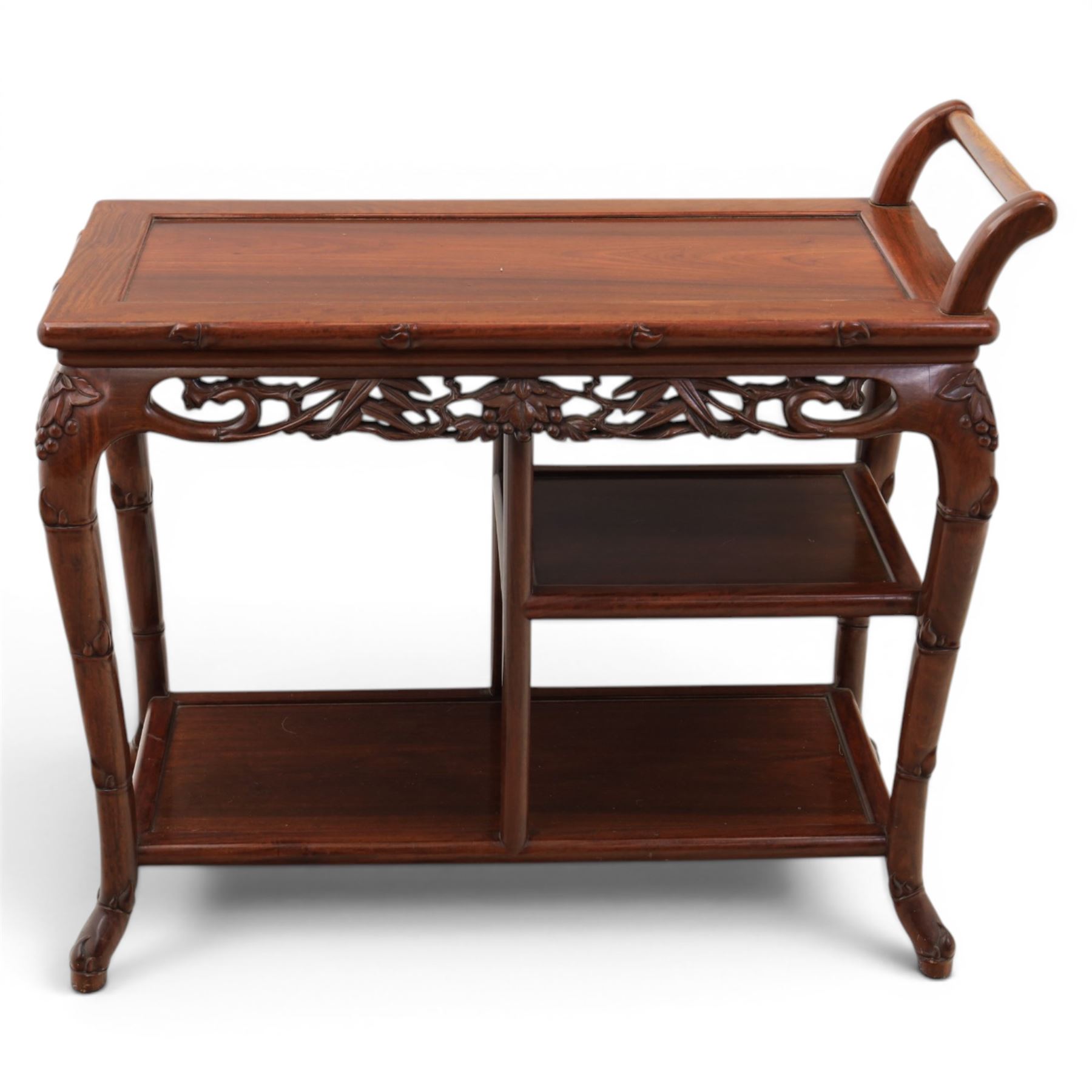 20th century Chinese ornately hardwood tea trolley, rectangular top with handle, pierced frieze above a half shelf above a full length undertier, raised on shaped supports