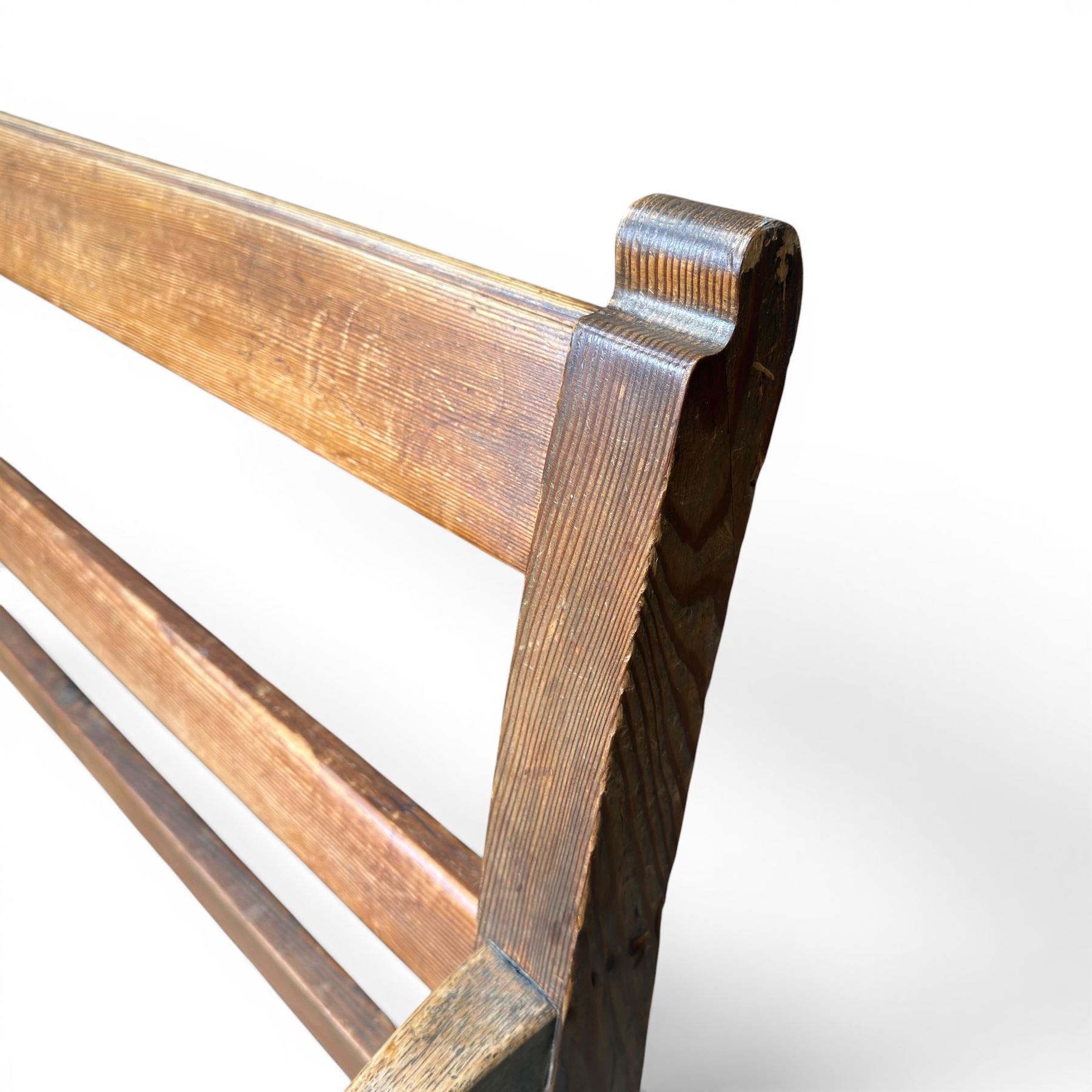 Early 20th century pine and oak bench seat, stained pine rail back frame with shaped oak arms