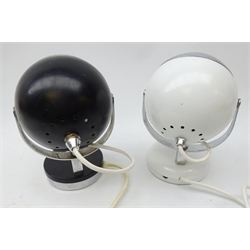  Two 1960s/ 70's 'Eyeball' adjustable desk lamps in black and white with chrome mounts, H21cm   