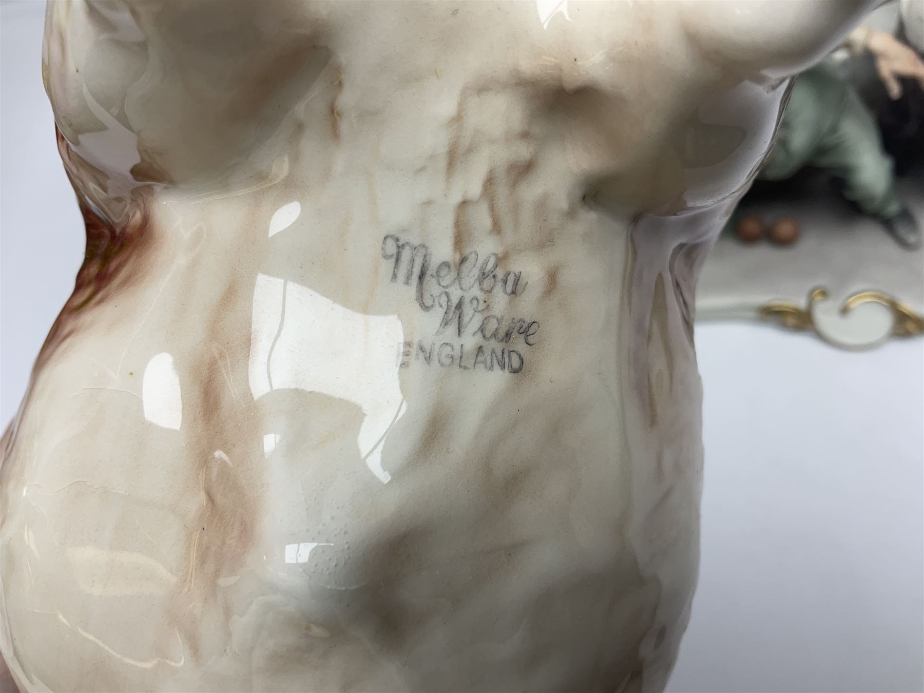 Two Capodimonte figures together with Melba Ware bull and other ceramics 