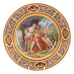 Royal Vienna plate, featuring Hercules and Omphale, the rim decorated with floral and gilt...