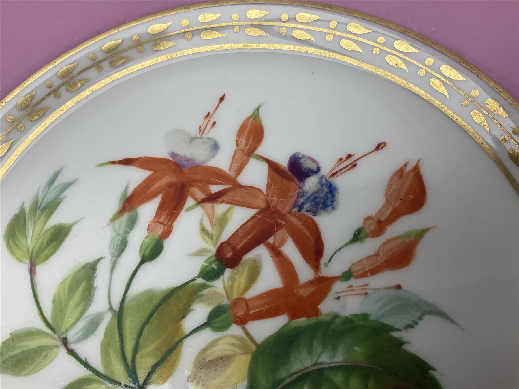 Victorian Copeland, Botanical dessert service, decorated with floral sprigs to the centre with a pink and gilt border, comprising five comports and seven plates, largest comport H20cm, plate D22cm