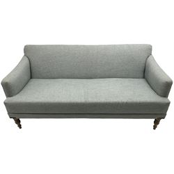 Victorian design three seat sofa, upholstered in pale blue textured fabric, on turned front supports