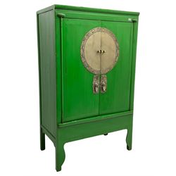 Chinese green lacquered hardwood moon cabinet, two panelled doors with metal mounts decorated with the zodiac animals and traditionally dressed figures, enclosing two drawers and shelves over single secret compartment