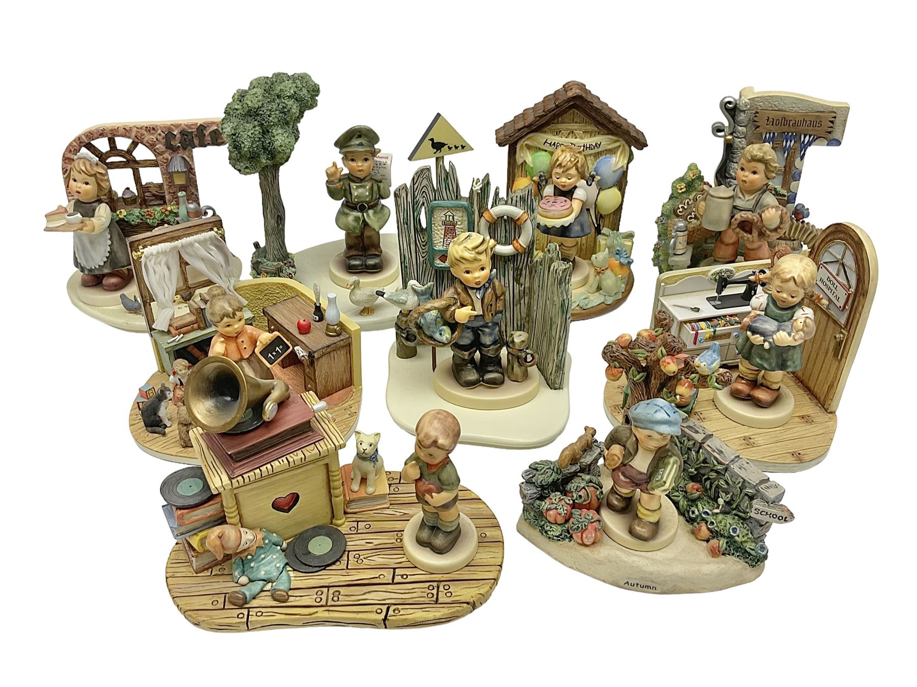 Nine Hummelscapes by Goebel, to include Bavarian Bire Garten, Cuck Crossing, Fisherman's Feast, Strudel Haus etc, each with associated Hummel figures, tallest H14cm 