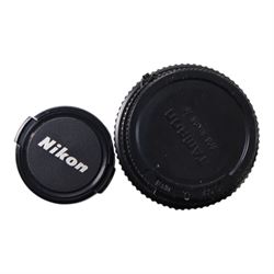 Eight camera lenses, comprising Canon Ultrasonic Zoom EF 75-300mm 1:4-5.6 lens, AF Nikkor 35-70mm 1:3.3-4.5 lens, Nikkor 60-180mm 1:4.5-5.6 lens, Canon Zoom EF 28-80mm 1:3.5-5.6 lens, Canon Zoom EF 80-200mm 1:4.5-5.6 lens, Sigma 70-300mm 1:4.6-5.6 DL Macro, Sigma Zoom 70-210mm 1:4-5.6 UCII lens and a Sigma AF 70-300mm 1:4-5.6 APO Macro lens, all with lens caps