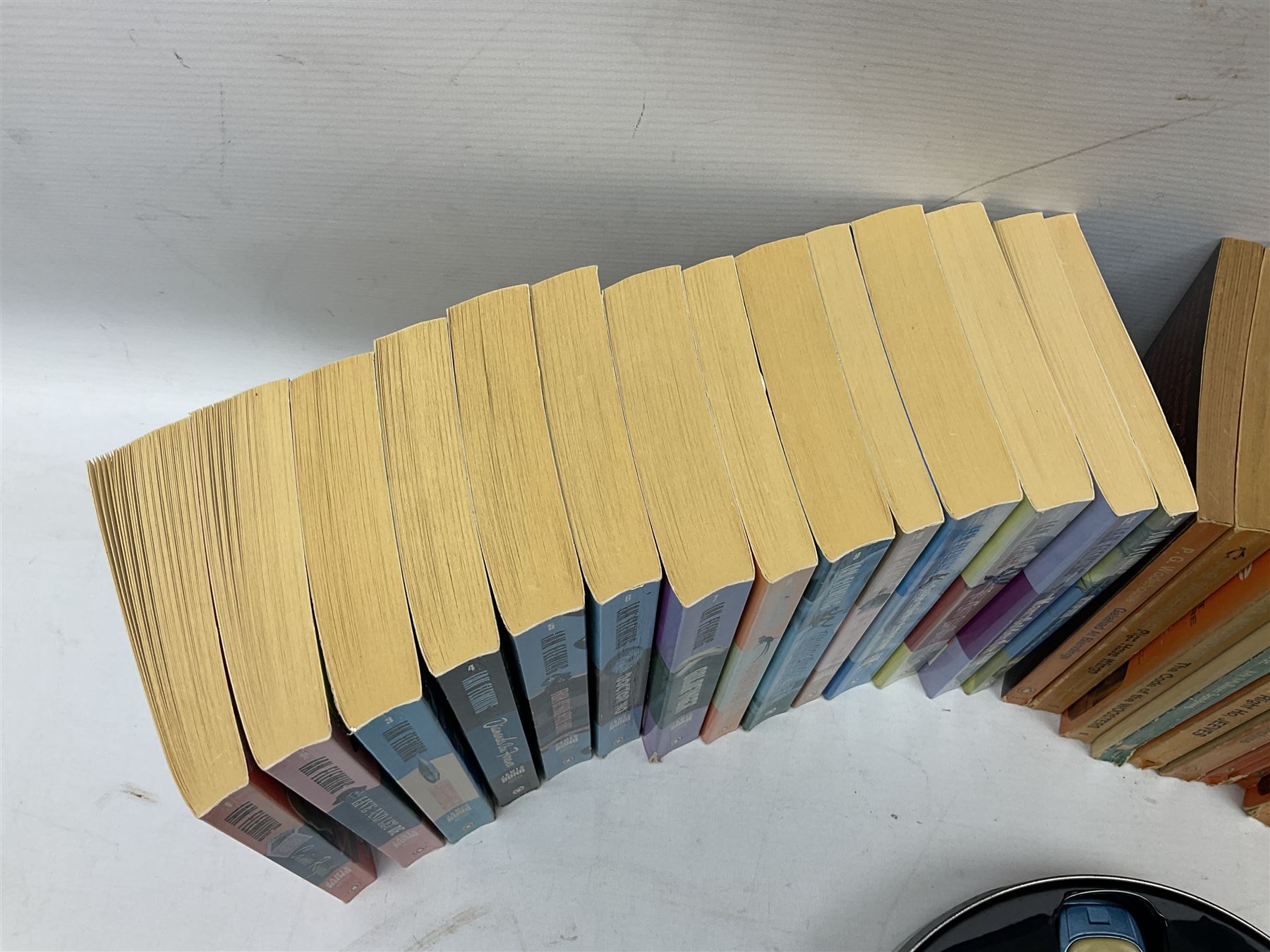 Wodehouse P.G.: Mr. Mulliner Speaking. First American edition 1930; eighteen P.G. Wodehouse paperback books; fourteen James Bond paperback books and Corgi tin of four James Bond die-cast model cars