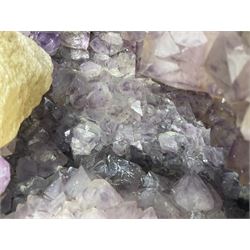 Amethyst crystal ‘cathedral’ geode, free standing with flat base and prepared outer surface, with well-defined crystals of various sizes within the cavern, H39, L32cm