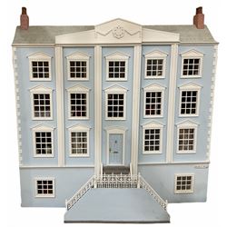 Large and impressive Georgian style wooden double fronted four-storey dolls house with pale blue stucco finish under a faux tiled roof, double balustraded steps to the front leading to a central door, the double higned front opening to reveal a grand panelled entrance hall with columns and stairs down to two basement rooms, one fitted as a games room, two rooms to each the ground floor and first floor and three rooms to the second floor, all fully decorated, some with moulded ceilings, all with floor coverings/rugs and curtains, fully furnished with quality wooden furniture and comprehensive range of accessories, fitted fire surrounds and porcelain bathroom fittings, electric lighting, selection of dolls etc; bears name plaque 'Harbour Wynd' H107cm W105cm D49cm