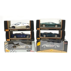 Maisto - six 1:18 scale die-cast models comprising Porsche 911 GT1 Le Mans (1998), Premier Edition Mercedes Benz 300 SLR Mille Miglia 1955, Ford GT90, Jaguar XK180, Jaguar XK8 and Jaguar XJ220, all boxed