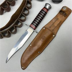 Mundial Brazil bowie knife, the 15.5cm steel blade inscribed 'Sheriff Knife', with banded and aluminium hilt; in leather sheath L29cm overall; British Army felt covered metal water bottle with webbing strap; leather 12-bore cartridge belt; and small pair of non-military binoculars in part case (4)
