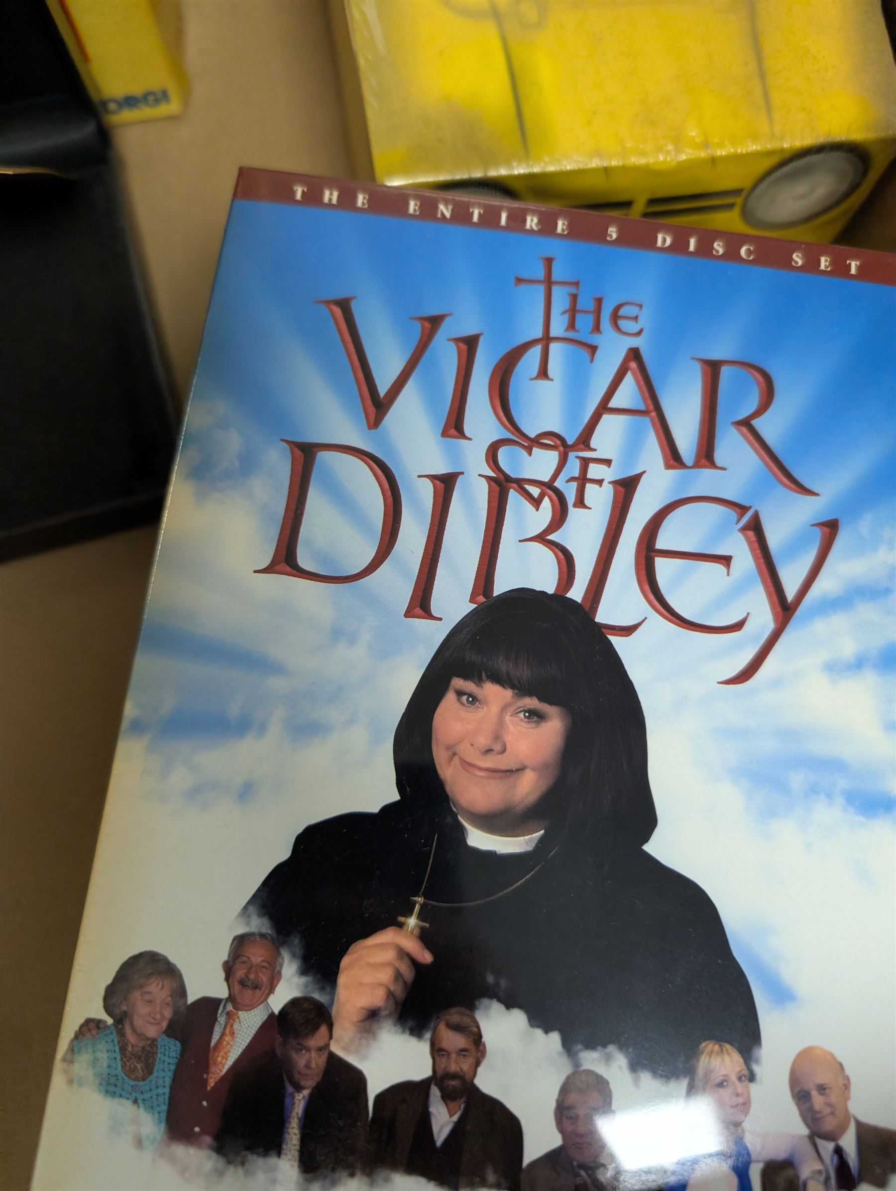Collection of Only Fools and Horses memorabilia, including Westminster Mint limited edition fifty pence coin set, DVD box set, Corgi Reliant Regal, playing cards, framed bank notes, Griffin Cartoon of the bar scene, etc, together with a Vicar of Dibley DVD box set