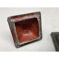 19th century lead tobacco box, the body of square form decorated with panels of courting couples in relief supporting stepped tapering lid with figural male head finial, H18.5cm