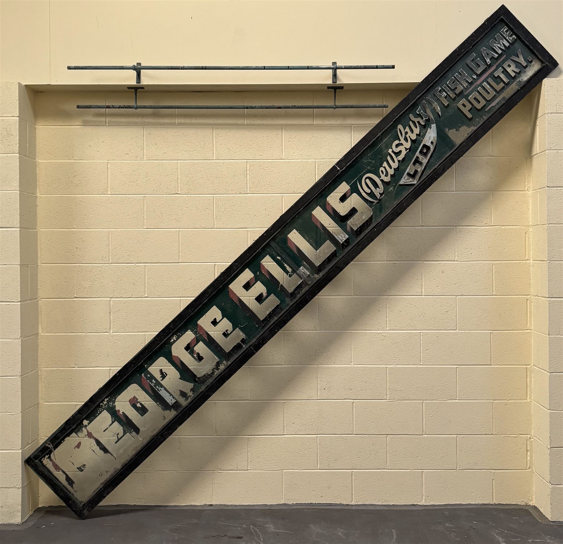 Reverse painted glass shop advertising sign, late 19th century, reading 'George Ellis Dewsbury Ltd Fish, Poultry and game.' L407cm H51cm.  - COLLECTION BY APPOINTMENT FROM: The White House, Thirsk Road, Easingwold, York, YO61 3NF - CALL 01723 507111 TO ARRANGE