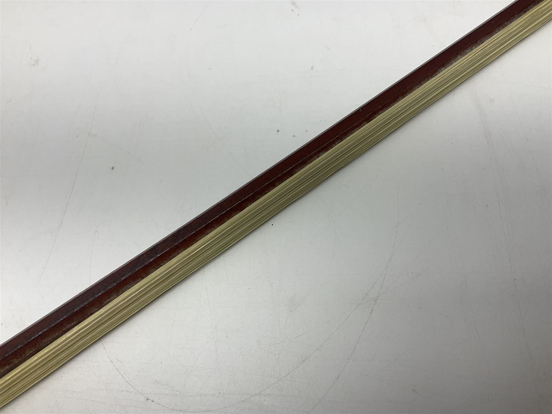 Nickel mounted pernambuco violin bow stamped R. Paesold L73.5cm