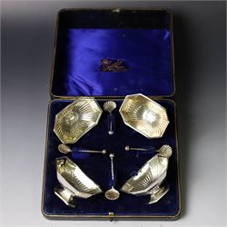 Set of four late Victorian silver open salts, of octagonal part fluted form, with four cla...