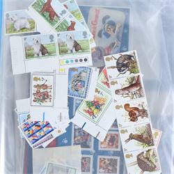 Great British coins and stamps, including a small quantity of Queen Elizabeth II mint decimal stamps, commemorative crowns, first day covers, etc
