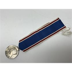 Collection of WW2 and police medals c.1933-1955, awarded to Eric Drinkwater comprising 1939-45 War Medal, Defence Medal, 1939-45 Star and Burma Star, on wearing bar; 1918-62 General Service Medal with Cyprus clasp to P.S. E.G. Drinkwater; boxed; Police Long Service and Good Conduct Medal to Const. Eric C. Drinkwater; cased; Royal Life Saving Society bronze medal to E.C. Drinkwater July 1933; boxed; and George V 1937 coronation medallion; boxed.