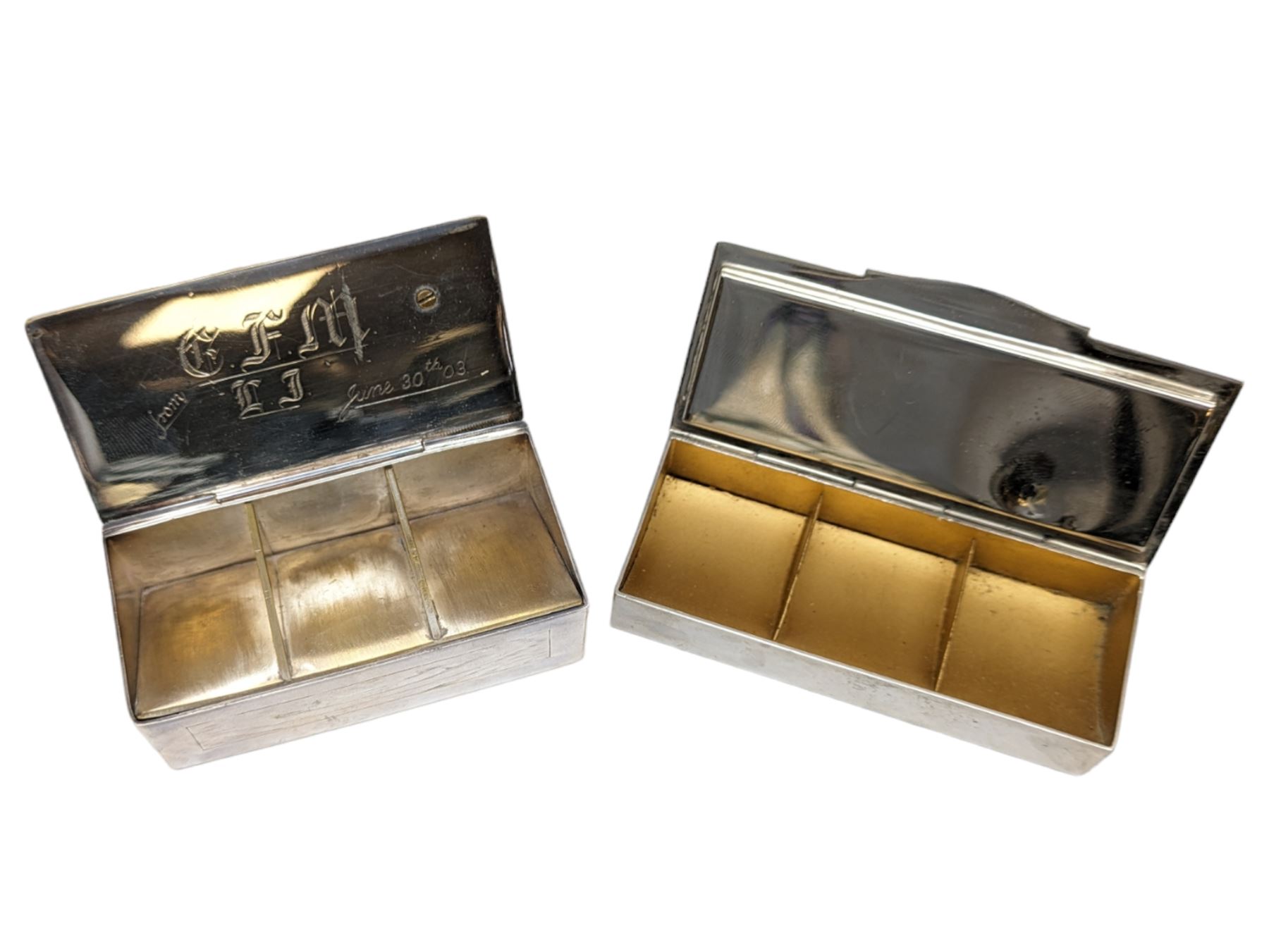 Two three division stamp boxes, the first with enamelled ladybird decoration and engraved initials to the inside of the hinged cover, the second with glass cover showing three King George V stamps