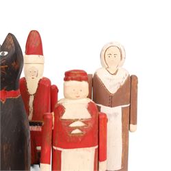 American Folk art figures, by Wolf Creek, comprising two cats, Father Christmas, Mrs Clause, Pirate and three others, with stamps and signatures beneath     