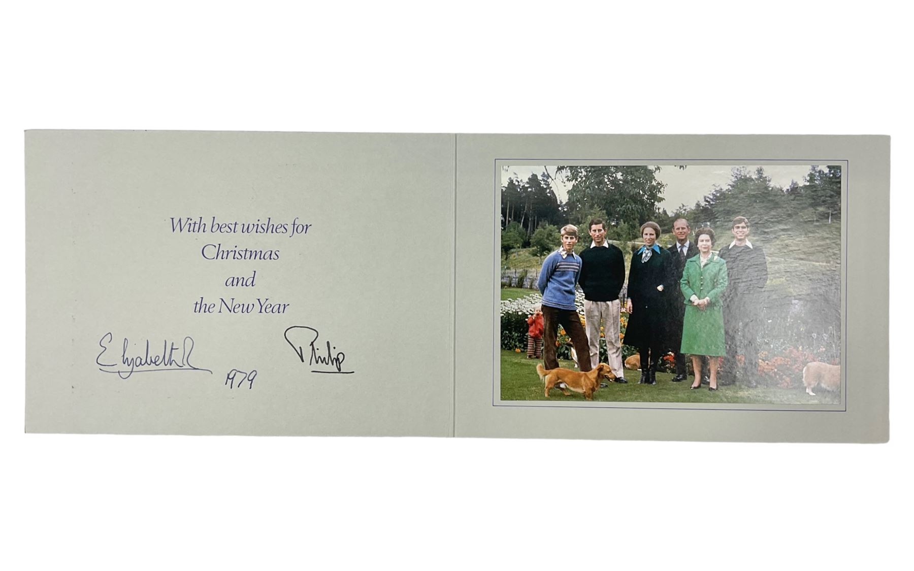 H.M. Queen Elizabeth II and HRH The Duke of Edinburgh, signed 1979 Christmas card with twin gilt ciphers to cover, colour photographic print of the Royal family standing in a garden, signed ‘Elizabeth R and Philip’ with manuscript date 1979 below