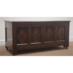  18th century and later oak heavily carved chest, arcade frieze above four lozenge carved panelled front, hinged lid, stile supports, W119cm, H56cm, D49cm  