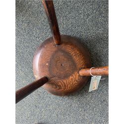 18th century ash and elm milking stool, circular figured top raised on cylindrical supports