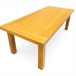 Late 20th century solid light oak dining table, on square supports