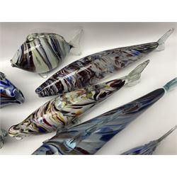 Collection of mid 20th century murano style glass fish, each with multi coloured inclusions largest L42cm