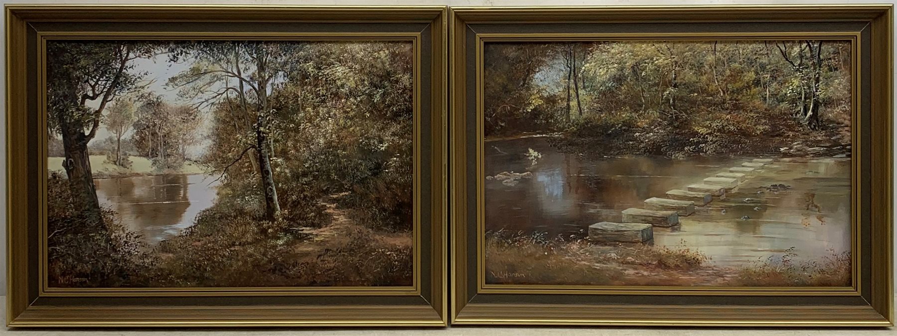 N C Hanson (British 20th century): 'Stepping Stones Throstle Nest Littlebeck' & a River scene, pair oils on board signed one titled verso 32cm x 47cm (2)