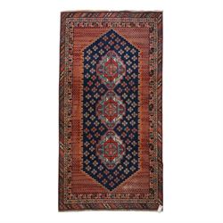North West Persian Heriz hand-knotted rug, indigo field with three central stepped geometr...