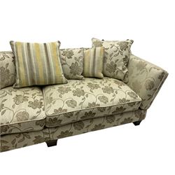 Grande four-seat Knole sofa, upholstered in floral pattern fabric with matching scatter cushions 