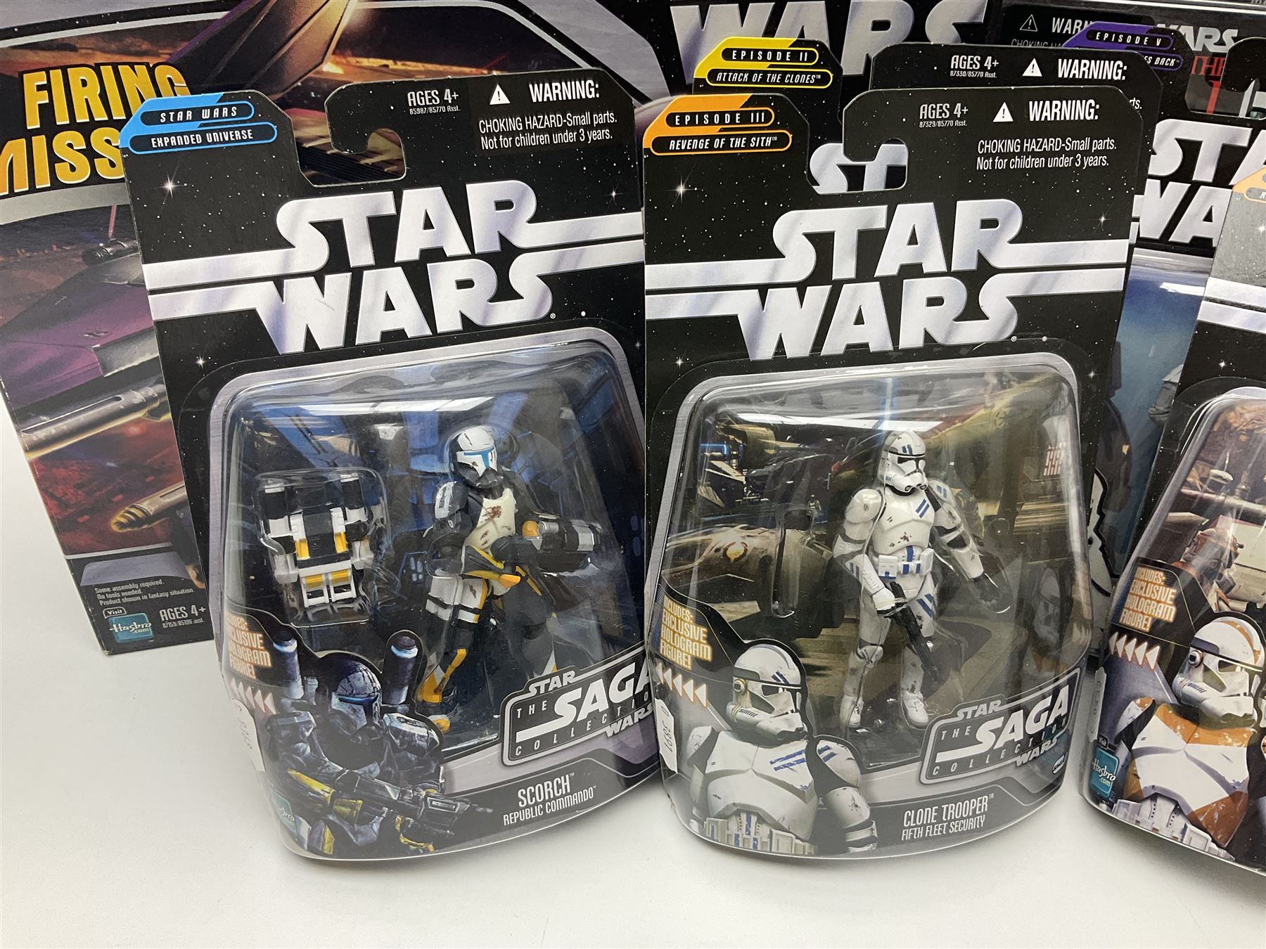 Star Wars - The Saga Collection - Mace Windu's Jedi Starfighter; boxed; and twelve carded figures comprising Biker Scout, General Grievous, At-At Driver, Clone Trooper Sergeant, various other Clone Troopers and Commander Cody, Snowtrooper and Scorch Republic Commander; all in unopened blister packs (13)